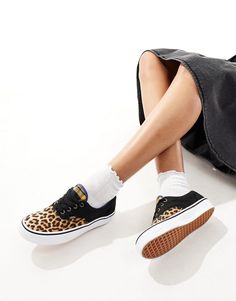 Shoes by Vans Get your kicks Lace-up fastening Low-profile design Signature Vans branding 'Off The Wall' heel tab Durable rubber outsole Signature waffle tread High-top Leopard Print Sneakers For Streetwear, Leopard Print High-top Sneakers For Streetwear, Sporty Leopard Print Sneakers For Streetwear, Leopard Print Lace-up Sneakers For Streetwear, Leopard Print Sneakers With Round Toe And Rubber Sole, Leopard Print Sneakers With Rubber Sole, Vans Lace-up Canvas Shoes With Speckled Midsole, Leopard Print Lace-up Sneakers, Leopard Print Low-top Sneakers With Speckled Midsole