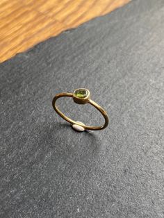 Green peridot ring Raw green peridot stone from Brazil. 100% handmade, metal is brass gold plated Size is 6,5 US For different sizes, please send me a message Peridot Stone, Peridot Ring, Green Peridot, Plate Size, Crystal Rings, Stackable Rings, Handmade Ring, Gold Plate, Jewelry Rings