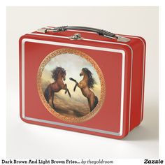 an orange lunch box with two horses on it