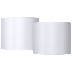 two white lamps are next to each other