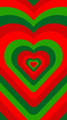 a red and green heart surrounded by many different colored lines in the shape of hearts