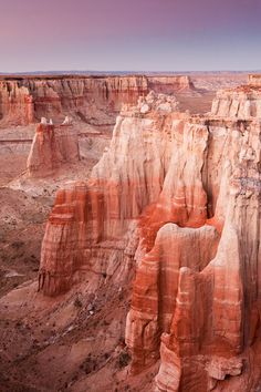 the landscape is beautiful and colorful in this photo, it looks like an amazing place to see