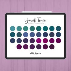 a card with the words jewel tones on it and an image of several different colors