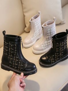 These adorable houndstooth mid-hight boots for girls have a super trendy look. Has a convenient zipper close at the front so your little princess can easily slip them on all by herself Heel Type: Low-heeled Out-sole Material: Rubber Closure: Front Zipper Closure Upper Material: PU Please refer to the size chart