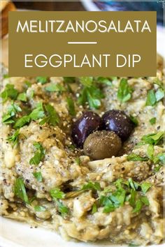 an eggplant dip with two olives in it and the words, meliznosalata eggplant dip