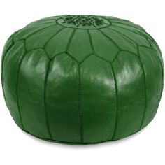 a green leather poufle with an intricate design on the top and bottom, is shown