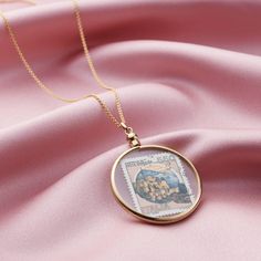 Our Round Glass Locket Necklace is handcrafted in the finest Sterling Silver then plated in 18ct Yellow gold plate. It makes a beautiful gift for someone special.This necklace features a stunning sterling silver circular pendant with a glass centre that can be opened and used to display special objects and memories inside.For example, pressed flowers, stamps, photos or locks of hair all work perfectly displayed in this necklace.The locket is opened by turning the fastening at the top of the pend Round Locket Necklace, Sterling Silver Locket Necklace, Round Locket, Sterling Silver Locket, Glass Locket, Silver Lockets, Sterling Silver Hoops, Stylish Gifts, Dance Moves