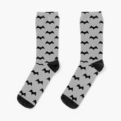 Super soft all-over printed knit socks with extra cushioning in the sole. Suitable for men and women. Add some fun to your superheroe wardrobe with this awesome minimal design of aBAT logo or give it as the perfect gift to a designer friend! Choose your size and color below then BUY IT NOW to place your order. Superhero Socks, Bat Logo, Hero Design, Designer Socks, Minimal Design, Socks For Sale, Chiffon Tops, Crew Socks, Knitting Socks