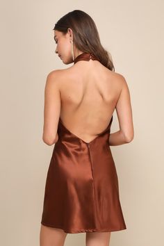 The Lulus Beyond Classy Brown Satin Halter Mini Dress is perfect for a night of bubbly and dancing! Sleek woven satin shapes this chic dress that has a halter neckline (with button closures) and a crisscrossing bodice. The column silhouette continues down to a mini hem with a thigh-high slit at the front. Hidden back zipper/clasp. Fit: This garment fits true to size. Length: Mid-thigh. Size medium measures 23.5" from top to bottom. Bust: Great for any cup size. Waist: Loosely Fitted. Hip: Loosel Brown Homecoming Dresses, Brown Halter Dress, Beach Wedding Outfit, Satin Halter Dress, Casual Wedding Guest Dresses, Brown Mini Dress, Beach Wedding Guest Dress, Womens Trendy Dresses, Pretty Shorts