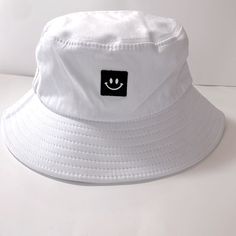 Smiley Bucket Hat Trendy Contemporary Classic Lightweight Unisex Bucket Hat, Perfect For Going Out Everyday, Travel, Vacation, Casual One Size Adjustable Ribbons Inside Most Likely Never Worn Smoke-Free, Pet-Free Classic Bucket Hat Foldable Smiley Boonie Hat Trendy Unisex Lightweight Outdoor Travel Headwear Cute Bucket Hats, Boonie Hat, Contemporary Classic, Bucket Hats, Christmas Aesthetic, Travel Vacation, Outdoor Travel, Smiley, Bucket Hat