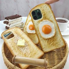 toast with eggs and cheese on it sitting in a basket