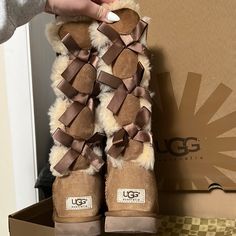 Ugg Bailey Bow Tall Boots Size 7 Minor Signs Of Wear Otherwise Very Great Condition High Ugg Boots Outfit, Tall Ugg Boots Outfit, Ugg Boots With Bows, Brown Uggs, Thrift Board, Cute Uggs, New Uggs, Ugg Boots Outfit, Uggs With Bows