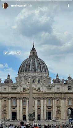 people are standing in front of a large building with a dome on it's roof