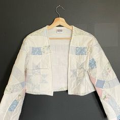 One Of A Kind Hand-Made Garment Made From Vintage Repurposed Quilt. Cropped Shirt-Jacket / Quilt-Coat / Kimono-Shirt. Bought For A Shoot That Was Canceled Never Worn! Pics Look A Lil Shadowy But It's Not Dirt Or Smudges, Jacket Is Very Clean / Pristine Sleeves Are 20.5” Long (Shoulder Hem To End Of Sleeve) 8” Sleeve Opening. Laid Flat It’s 20” Across The Back From Underarm To Underarm. 16.25” Long From The Back Of Neck Straight Down Spine To Bottom Hem One Pocket At Front Tags: Psychic Outlaw, E Upcycle Quilt Jacket, Cropped Jacket Pattern, Crop Jacket Pattern, Quilt Jackets, Repurposed Quilt, Quilt Coats, Quilted Jacket Pattern, Thrift Wishlist, Handmade Jacket