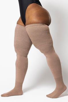 Elevate your spring wardrobe with our Timeless Taupe Thunda Tubbies. This classic and versatile shade of taupe adds sophistication to any outfit, while the lightweight cotton blend ensures all-day comfort and breathability. Whether you're dressing up or keeping it casual, these thigh highs are a timeless choice for every occasion. s i z i n g + m e a s u r e m e n t s Length: Heel to cuff 28 inches Recommended: For upper thighs that measure 24-35 inches l o o k a f t e r m e 80% Cotton, 10% Nylo Comfortable Fitted Beige Bottoms, Alphabet Code, Thigh High Socks, Cozy Gift, Swim Suits, Solid & Striped, Spring Wardrobe, High Socks, Thigh Highs