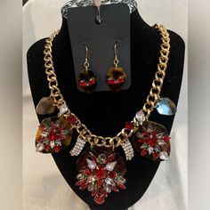 Gold Tone Fashion Necklace And Earring Set. Red Bling Stones With Animal Print Base. New. Never Worn. Sugar Skull Earrings, Pear Shaped Pendant, Double Chain Necklace, Artisan Necklace, Chunky Chain Necklaces, Choker Necklace Set, Skull Earrings, Necklace And Earring Set, Black Necklace