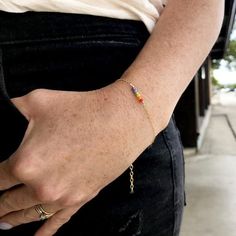 a rainbow of small (4mm) faceted glass beads adorns this simple chain bracelet. Includes a 2" adjustable chain. Bracelet size can be specified when adding to cart.$10 from every bracelet sale will be donated to QueerMeals.QueerMeals is a nonprofit in Provo, Utah that feeds and supports LGBTQ folks in crisis. Lgbtq Bracelet, Gay Jewelry, Gay Pride Bracelet, Gay Pride Jewelry, Lgbt Bracelet, Staple Earrings, Pyrite Bracelet, Pride Jewellery, Pride Bracelet