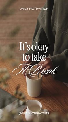 a person sitting at a table with a coffee cup in front of them and the words it's okay to take a break