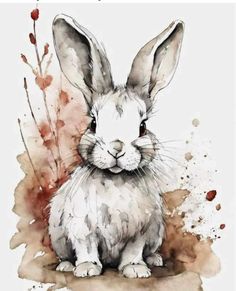 a watercolor painting of a rabbit sitting on the ground