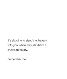 a white wall with a quote on it that says, it's about who stands in the rain with you, when they also have a choice to be dry