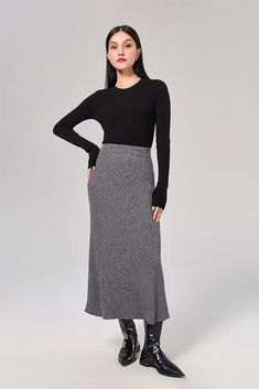 Sophisticated A-line Skirt: Resilient Washable Wool-blend Mastery Our A-line skirt, knit from a blend of washable wool, captures elegance in its purest form. The mid-high waist design elongates the silhouette, while the soft and resilient fabric ensures comfort all day. Style #: WKAI207 Fall Ribbed Skirt For Work, Elegant Ribbed Skirt For Workwear, Elegant Ribbed Skirt For Work, Elegant Ribbed Skirt, Ribbed Midi Skirt For Work, Elegant Knit Relaxed Skirt, Elegant Relaxed Knit Skirt, Elegant Long Knit Skirt, Elegant Ribbed Midi Skirt