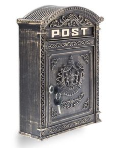 an old fashioned metal post box