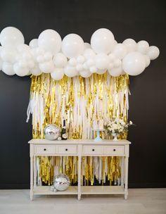 Get inspired by the latest trend in party decor, featuring Oh My Darling Party Co's Fringe Decor Shop! Learn how fringe backdrops can instantly elevate your party aesthetics, create a magical atmosphere and become the talk of the town. Dive into a world of sparkle and shimmer with this stunning party essentials guide! White And Gold Party, Gold Party Decor, Streamer Wall, Fringe Decor, Streamer Backdrop, Chic Bridal Showers, Gold Party Decorations, Balloon Installation