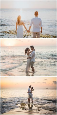 two people holding hands while standing in the water at sunset and on the beach with their arms around each other