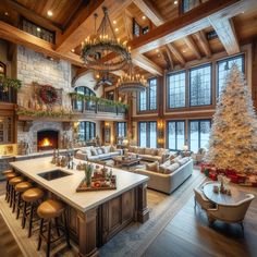 a living room filled with furniture and a fire place next to a christmas tree in front of a fireplace