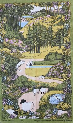 a green tea towel with sheep grazing in the grass and trees around it on a hillside