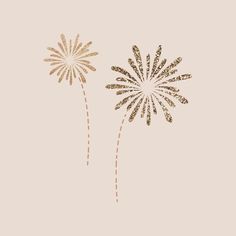 two gold fireworks on a pink background