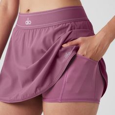 Nwt Alo Yoga Match Point Tennis Skirt In Soft Mulberry, Size Small. Sold Out Color. Will Come In Original Packaging! Smoke Free Home. I Ship Next Day! Purple Skort With Built-in Shorts, Purple Skort, Tennis Skirt Black, Yoga Skirt, Mulberry Color, Elastic Skirt, Match Point, Workout Tights, Skirt Trends