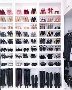 a closet filled with lots of different types of women's shoes and high heels