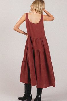 The Venice Maxi Dress - a versatile, stylish, and comfortable wardrobe staple. Made from lightweight gauze fabric, this tiered midi dress offers breathable elegance. Perfect for any occasion, from casual outings to special events. Casual Tiered Dress With Layered Hem, Casual Layered Hem Tiered Dress, Spring Layering Midi Dress, Spring Midi Dress For Layering, Flowy Tiered Casual Midi Dress, Flowy Tiered Midi Dress Casual, Flowy Tiered Midi Dress Casual Style, Casual Flowy Midi Dress With Tiered Skirt, Breezy Tiered Midi Dress With Ruffle Hem