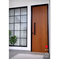 an image of a wooden door in front of a house