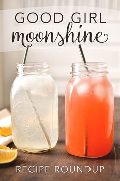 two mason jars filled with lemonade sitting on top of a wooden table