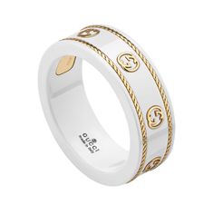 Add updated styling to your collection with this chic ring from Gucci. This unique ring is crafted in white zirconia and features the interlocking G design in 18k yellow gold in stations all the way around the band. Braided details in 18k yellow gold encircle the top and bottom of the band for added detail and interest. This ring measures 0.3 inches in width. Made in Italy. This ring is a size 7.25. Gucci Style #: YBC606826002015 Gucci Accessories Jewelry, G Ring, Chic Rings, Gucci Jewelry, Zodiac Jewelry, Luxury Rings, Ladies Diamond Rings, Expensive Jewelry, Icon Collection