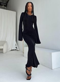 Long sleeve maxi dress Slim fitting 95% polyester 5% spandex Length of size US 4 / AU 8 shoulder to hem: 141cm / 55.5in Eyes is wearing a size US 2 / AU 6 Sheer material Tie fastening back of neck Flared sleeve Low back Good stretch Unlined Long Sleeve Maxi Dress Black, Shop Winter Dresses, Stylish Maxi Dress, All Black Dresses, Dress Slim, Office Siren, Maxi Dress Black, Maxi Dress Online, Grad Dresses