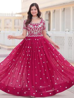 Embrace the vibrant elegance of this rani pink georgette gown, exquisitely embellished with dazzling sequin embroidery work. Designed to make you stand out, this gown is perfect for sangeet ceremonies and other grand celebrations. Fully stitched and available in sizes XS to XXL, it ensures a perfect fit for all body types. With a 3.5-meter flair that adds a graceful flow and a gown length of 56 inches, this piece promises a striking and elegant silhouette.
Ideal for a variety of occasions such a Designer Pink Sequined Salwar Kameez, Embellished Sharara For Navratri In Maxi Length, Embellished Maxi Length Sharara For Navratri, Navratri Embellished Maxi Sharara, Floor-length Gown With Dori Work For Diwali, Red Sequined Dress For Navratri, Pink Sequin Dress For Navratri, Anarkali Sequin Gown For Diwali, Embellished Semi-stitched Floor-length Dresses