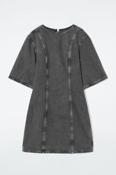 This paneled mini is our womenswear team's contemporary take on '60s shift dresses. It's crafted from organic- and recycled-cotton denim and has a round neck, vertical seam detailing and a lengthened zip pull. Complement the short hemline by styling it with knee-high boots. Slim fitZip closureOrganic cotton is grown from non-genetically modified seeds without chemical fertilizers or pesticides Shell: 80% Organic cotton, 20% Recycled cotton. Excluding trims / Machine wash Back length of size 6 is 32.87" / Model wears a size 6 60s Shift Dress, Shift Dresses, Women Magazines, Genetically Modified, Denim Shirt Dress, Denim Mini Dress, Poplin Shirt, Denim Mini, Crop Shirt