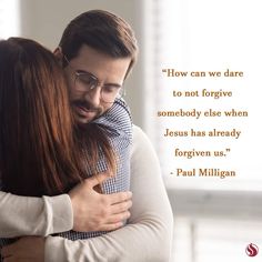 a man and woman hugging each other in front of a quote from paul milligan