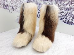 Exclusive brown white color fur boots! They are perfect combination of gorgeous look and warmth. Lined by a genuine sheepskin. Outside part is made of a real goat fur. Boots are designed for women who love the uniqueness and warmth, as withstand up to 50 degrees Celsius below zero. COLORS: EACH PAIR IS INDIVIDUAL! it can be more brown or black or white. Length and thickness of fur is diffrenet too. Please, contact. These beautiful boots are available in different natural color shades: brown, whi White Sheepskin Boots For Winter, White Sheepskin Winter Boots, Winter White Sheepskin Boots, White Faux Fur Trimmed Boots, White Boots With Faux Fur Lining, Cloth Hacks, Yeti Boots, Women Winter Boots, White Goat