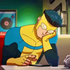 a cartoon character sitting at a table with his head in his hands and looking down