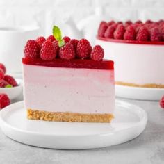 a piece of cheesecake with raspberries on top