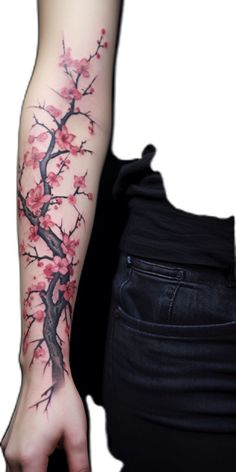 a woman's arm with a cherry blossom tree tattoo on the left side of her arm