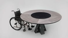 a table with a wheel chair underneath it