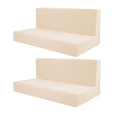 two pieces of white foam sitting next to each other on top of each other in front of a white background