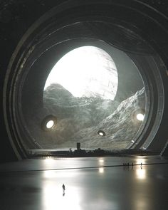 the inside of a space station looking out at mountains