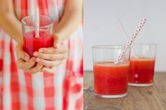 a woman holding a glass filled with red liquid next to two glasses full of juice