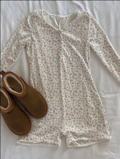 Experience relaxation and style with our Blossom Floral Cotton Pajama Bodysuit. Crafted from 100% cotton, this cozy bodysuit offers the perfect blend of softness and breathability, ensuring a restful night's sleep or lounging in comfort. The exquisite blossom floral pattern adds a touch of elegance, while the stretchy design and convenient snaps make it easy to wear. Upgrade your bedtime routine with this chic and comfortable Blossom Floral Cotton Pajama Bodysuit, perfect for lazy days and laid- Baggie Pajamas, Pj Sets Shorts, Shein Pajama Set, Stockholm Style Pajamas, Cute Pijamas Coquette, Girly Pajama Set, Pajama Dress Nightgowns, Cute Night Gowns, Cottage Core Pajamas